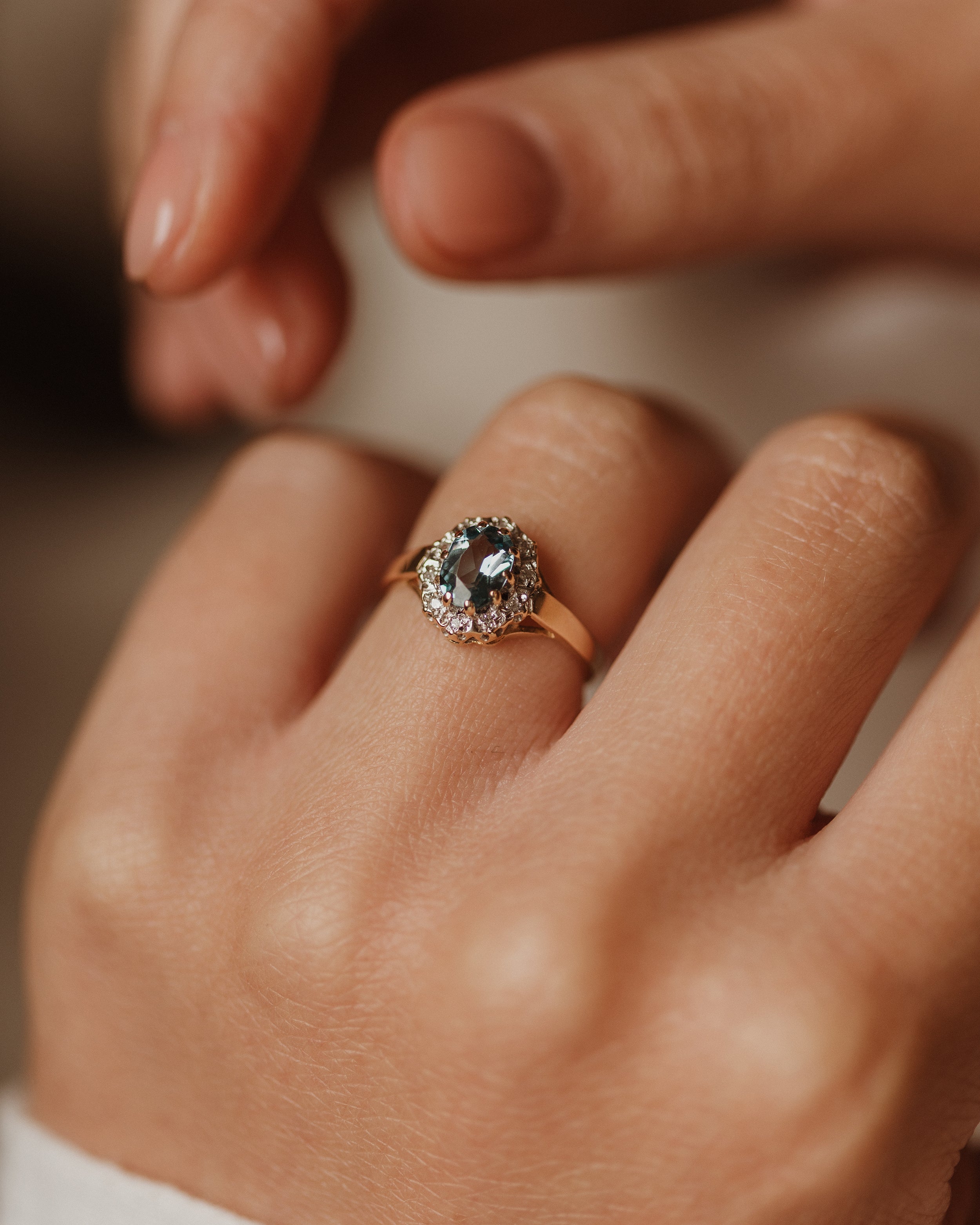 Image of Viola 1983 Vintage 9ct Gold Blue Topaz & Diamond Cluster Ring