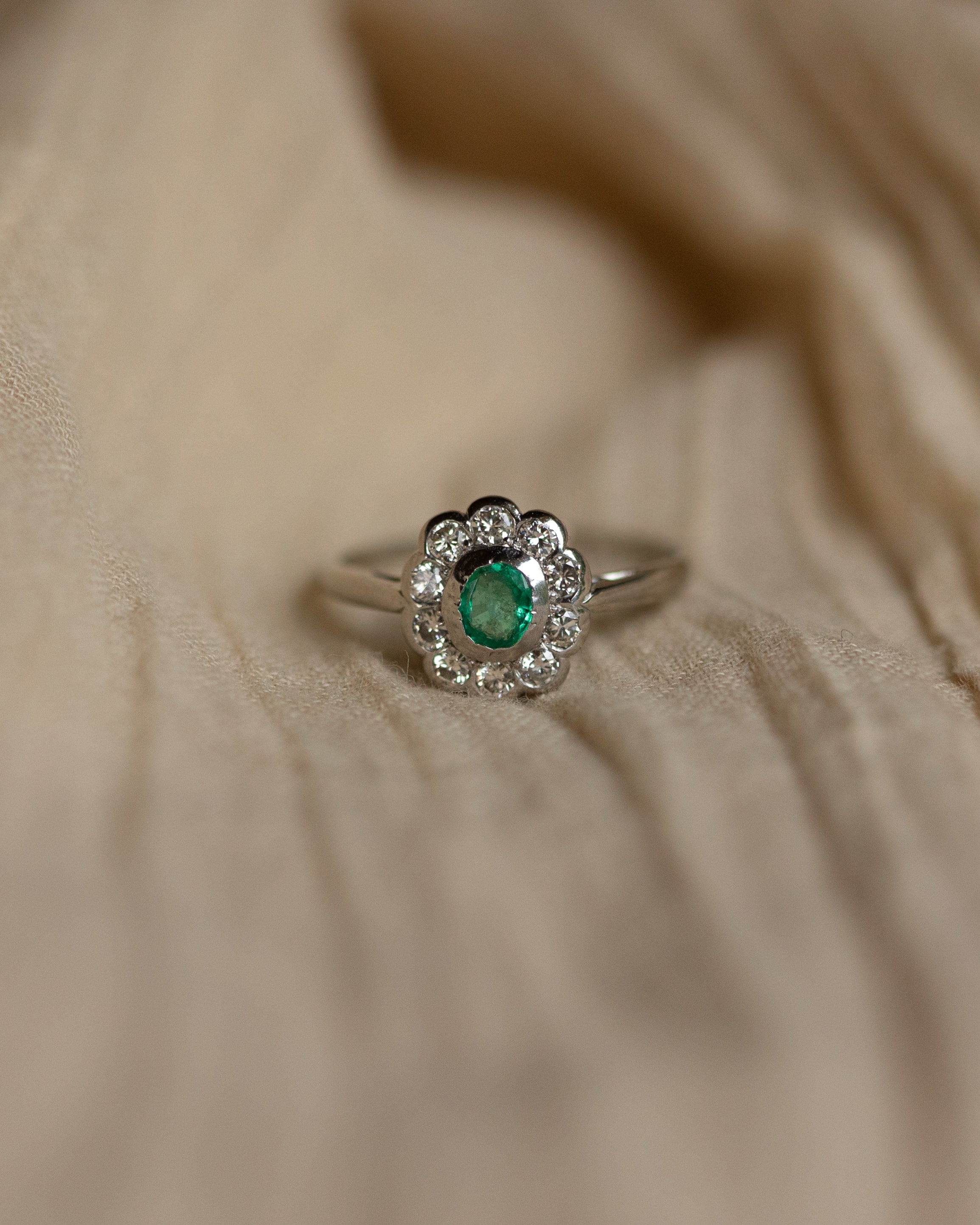 Image of Olive 1981 Vintage 18ct White Gold Emerald & Diamond Cluster Ring